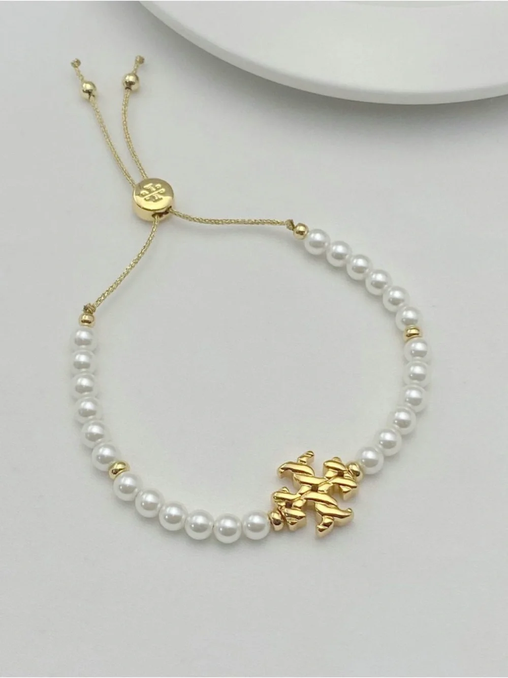 Tory Burch Gold and White Pearl Logo Adjustable Bracelet